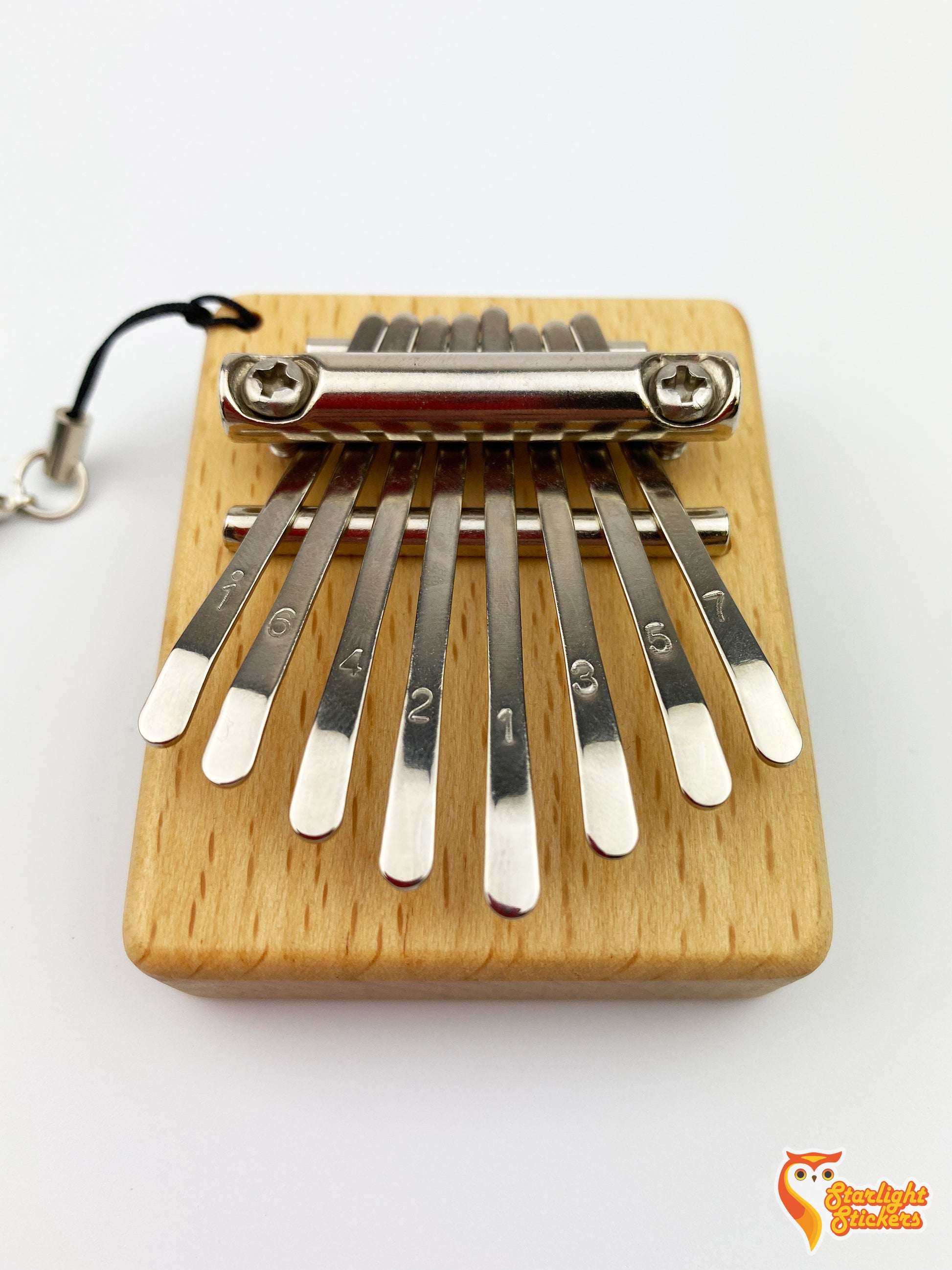 Close up of the 8 keys on the kalimba.