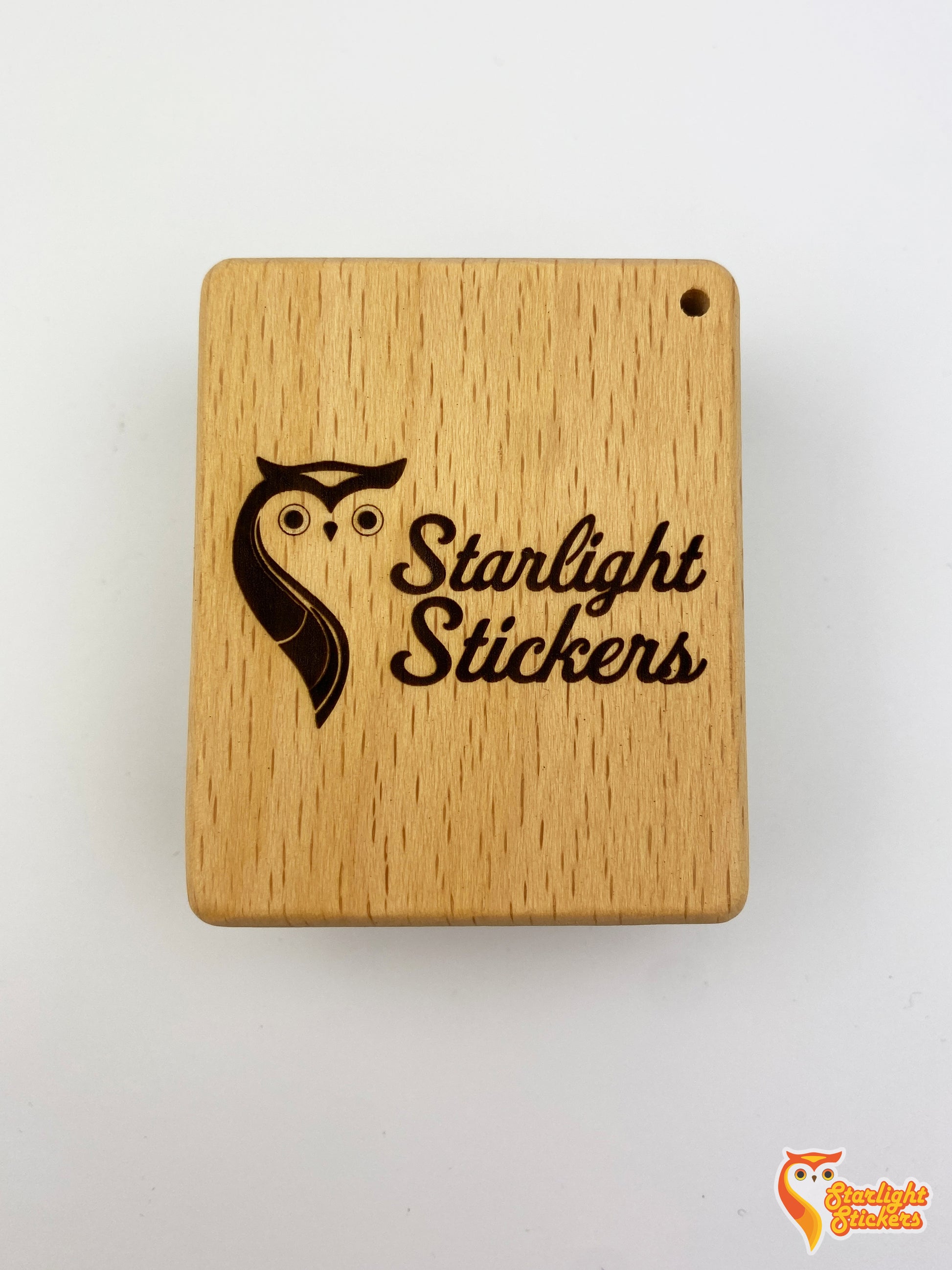 Back of the pocket kalimba with the engraving of, Starlight Stickers.
