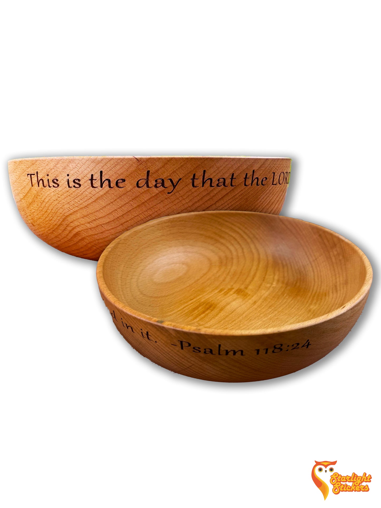 Two wooden bowls with a white background.