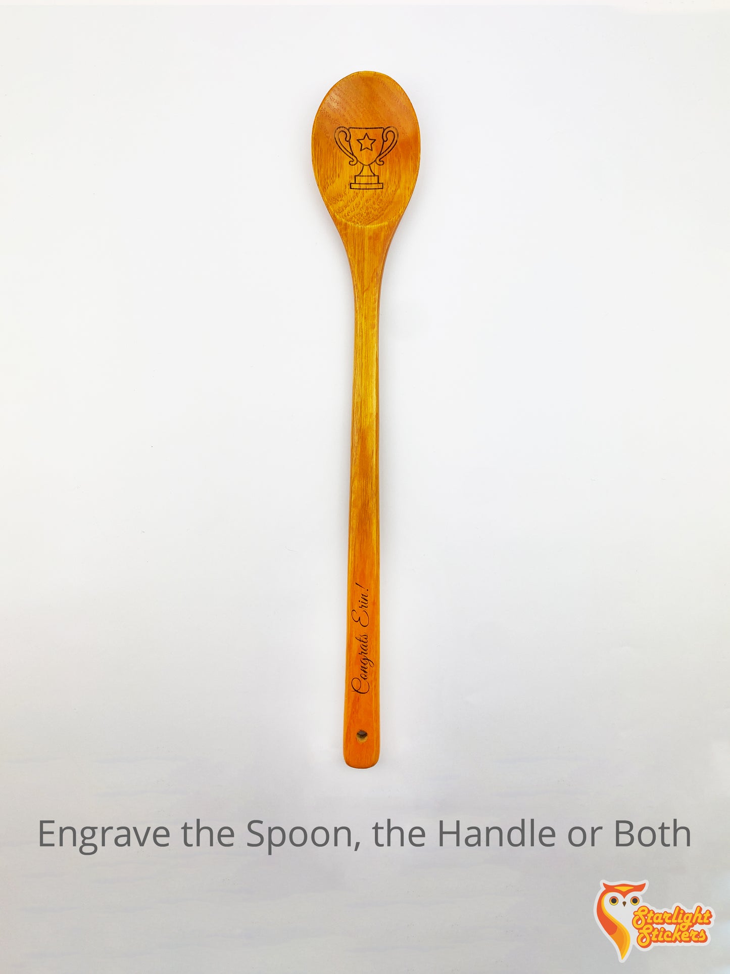 16.5 inch wooden spoon with a trophy engraved in the spoon.