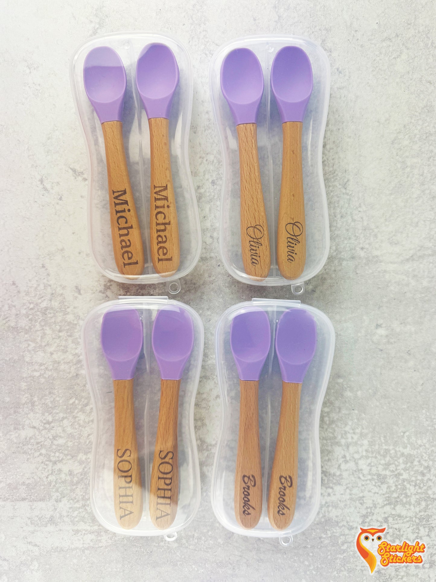 Baby spoons in 4 sperate clear plastic travel cases.