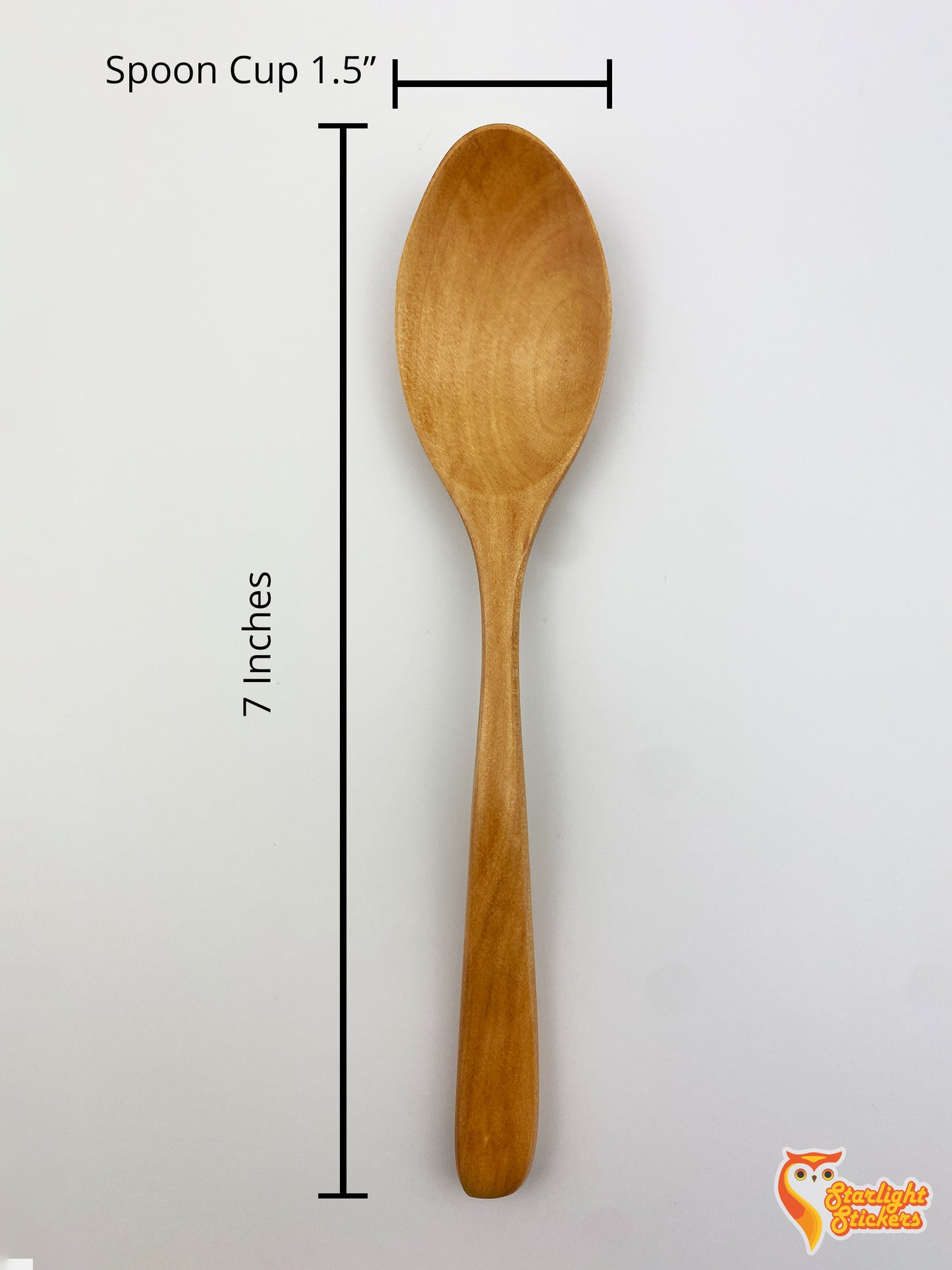 Spoon dimensions measuring at 7 inches tall and 1.5 inches wide.