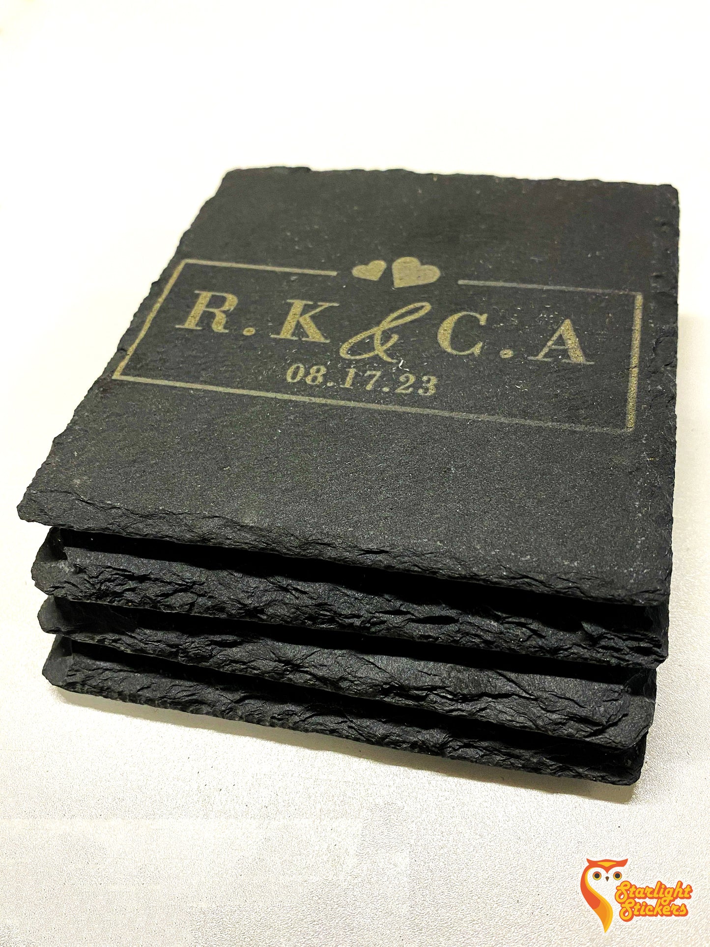 4 square coasters stacked on top of each other.