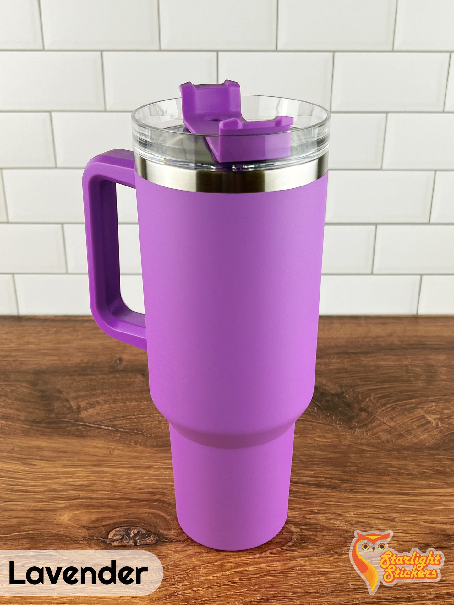 Lavender tumbler on a wooden table.