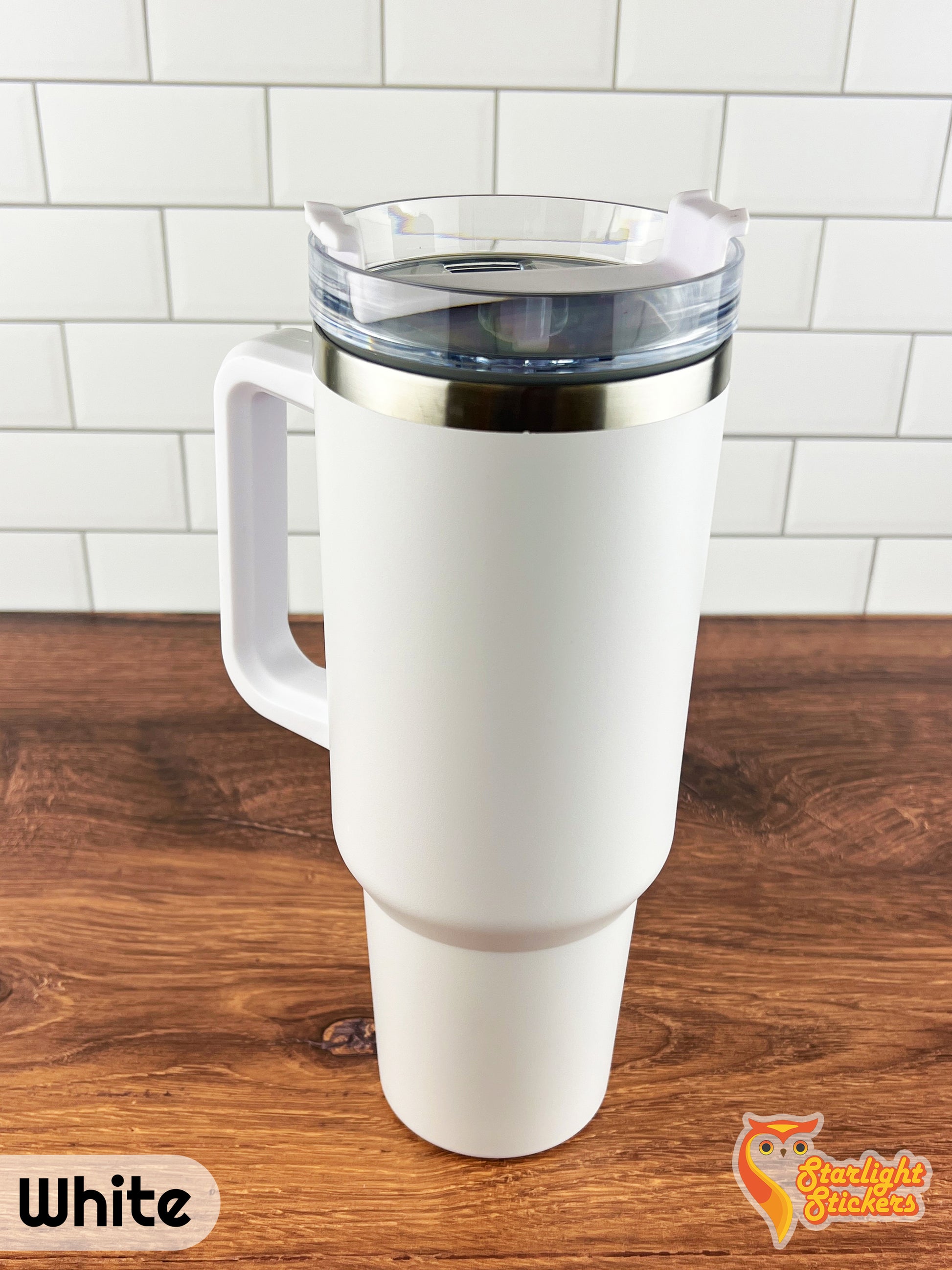 White tumbler on a wooden table.