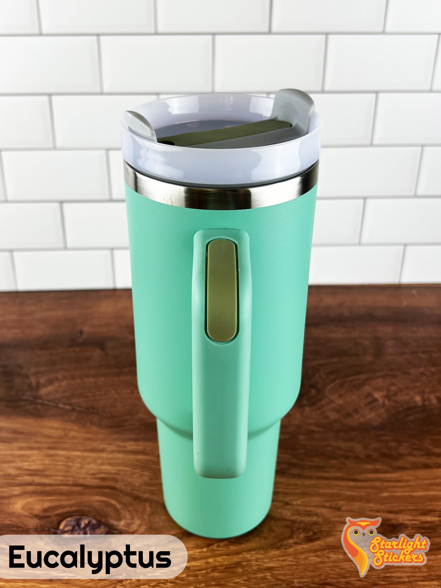 Eucalyptus tumbler showing the handle grip on a wooden table.