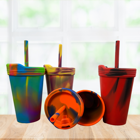 All silicone cup color options on a wooden table. 