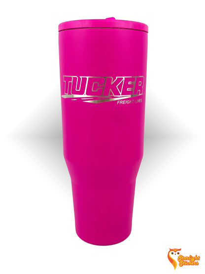 Pink tumbler with engraving. 