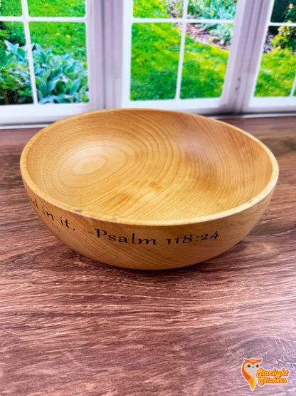 Engraved wooden bowl on a wooden table. 