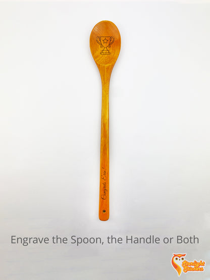 16.5 inch wooden spoon with a trophy engraved in the spoon. 