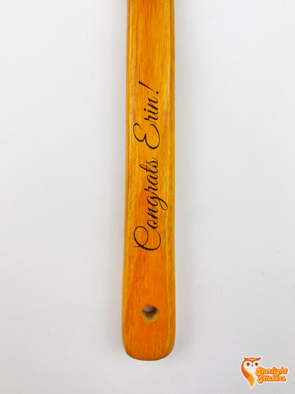 Handle engraved with the text; "Congrats Erin!"