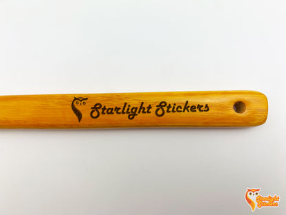 The text "Starlight Stickers" engraved into the handle. 